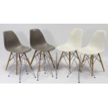 Two pairs of contemporary kitchen chairs, each chair with inter-changeable legs.