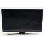 A Samsung UHD 40” Smart television, (lacking remote control & lead).