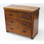 A 19th century small walnut chest, fitted two short & two long graduated drawers with iron swing