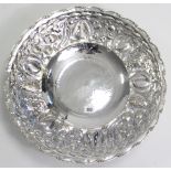 A large silver plated circular comport with embossed fruit border, & on round pedestal foot, 19”
