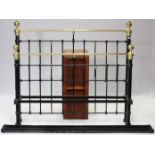 A Victorian-style black painted iron & brass 5’ bedstead complete with side irons.