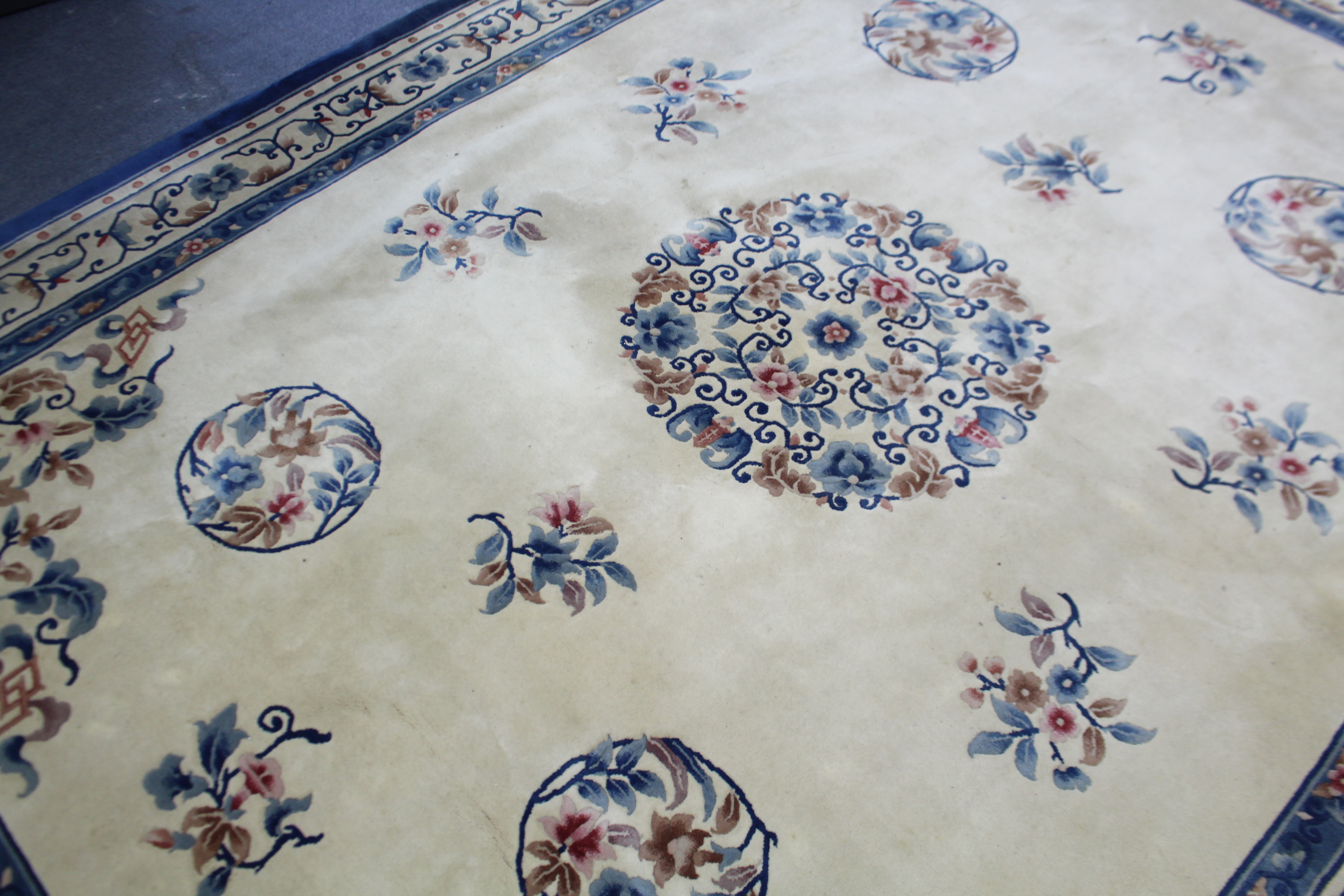 A Chinese-style carpet of cream ground & with bright-coloured floral design to centre within a - Image 4 of 5