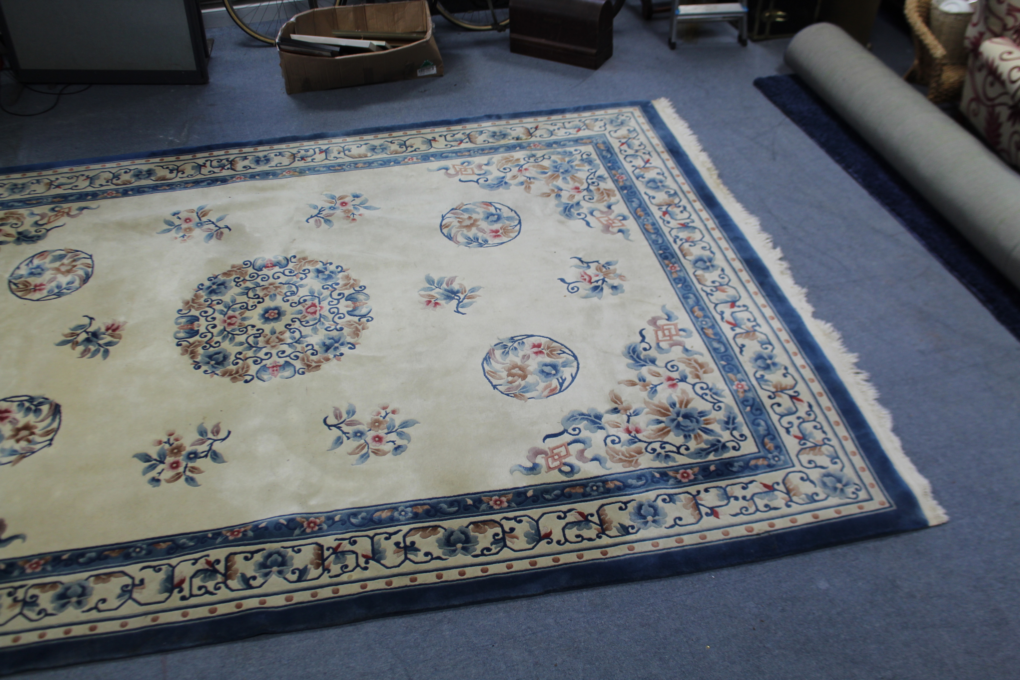 A Chinese-style carpet of cream ground & with bright-coloured floral design to centre within a - Image 3 of 5