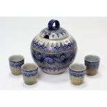 A German stoneware Rumtopf with stylised geometric design, 10½” high & a ditto set of four cups.