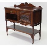 A 19th century carved mahogany side cabinet, fitted small drawer & cupboard above an open shelf, &