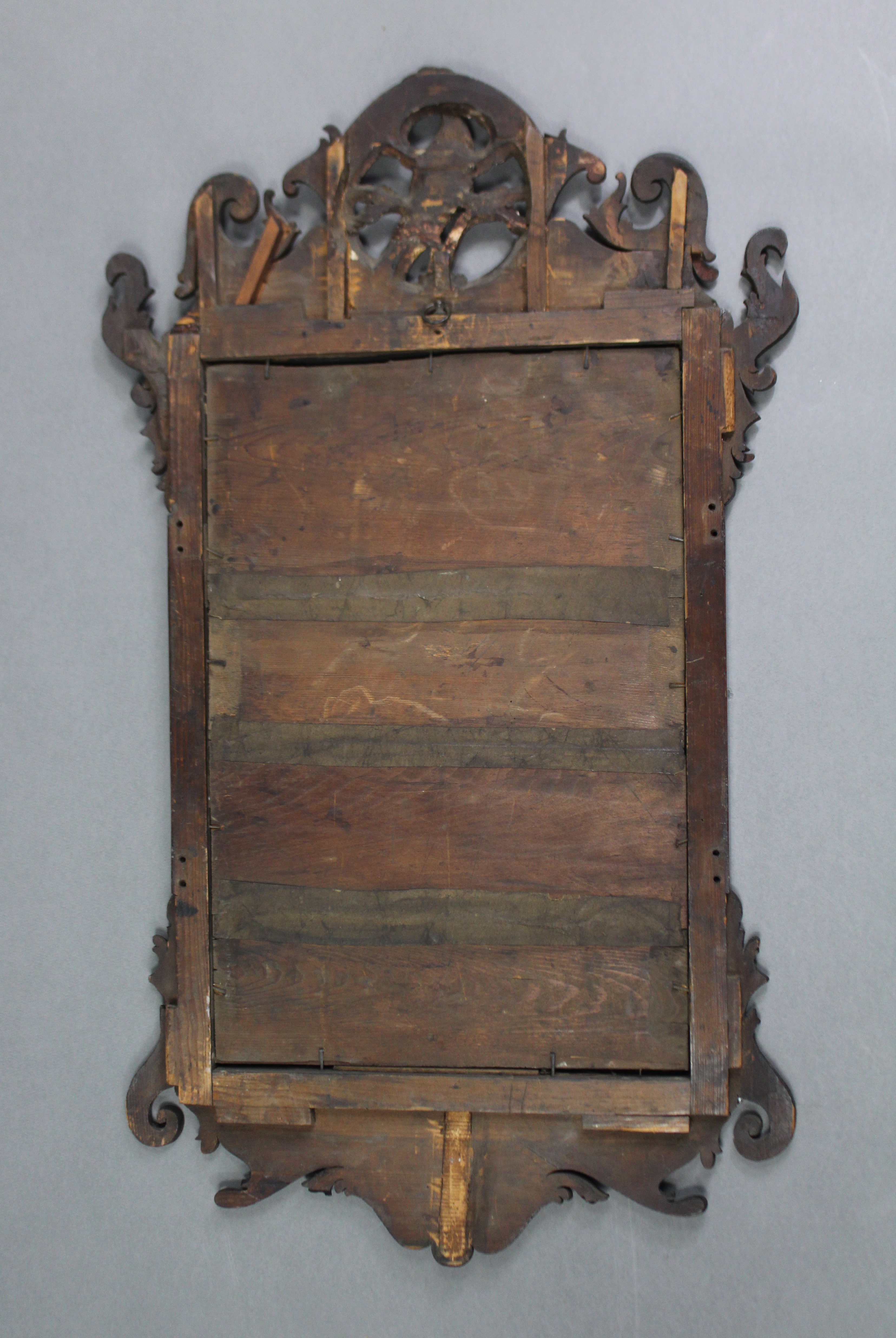 A 19th century mahogany Swansea-type rectangular wall mirror in fret-carved scroll frame with gilt - Image 4 of 4