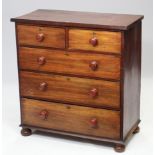 A Victorian mahogany small chest fitted two short & three long graduated drawers with turned knob