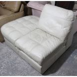 A cream leather two-seater settee, 52½” long.