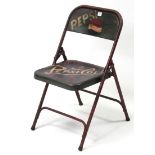 A modern metal painted “Pepsi-Cola” folding chair.