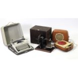 A Willcox & Gibbs vintage hand sewing machine; an Olympia portable typewriter, both cased; & a