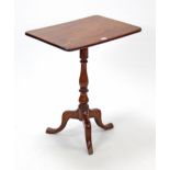 A 19th century mahogany tripod table with rounded corners to the rectangular tilt-top, & on