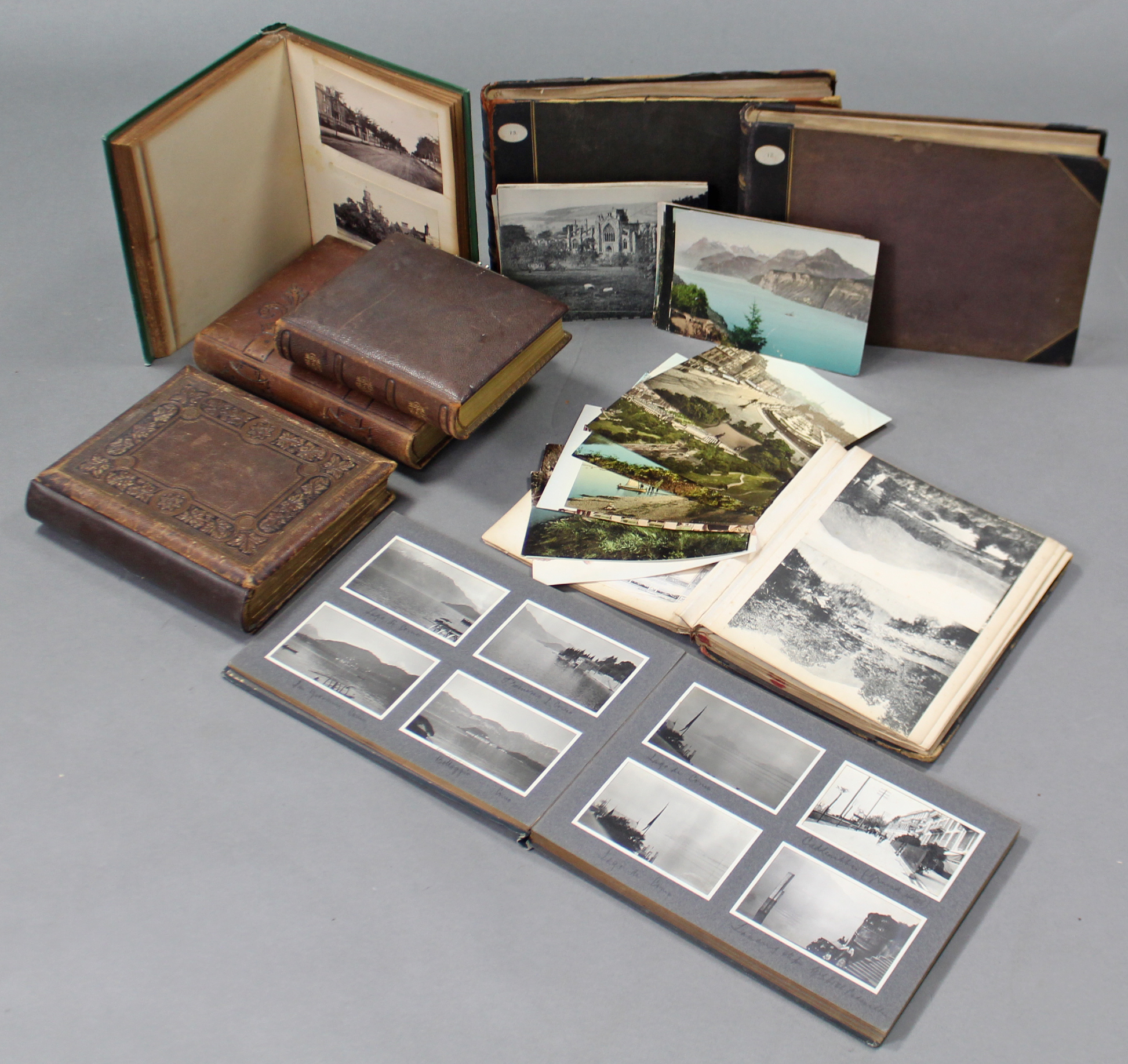 Eight various antique photograph albums, some containing photographs.