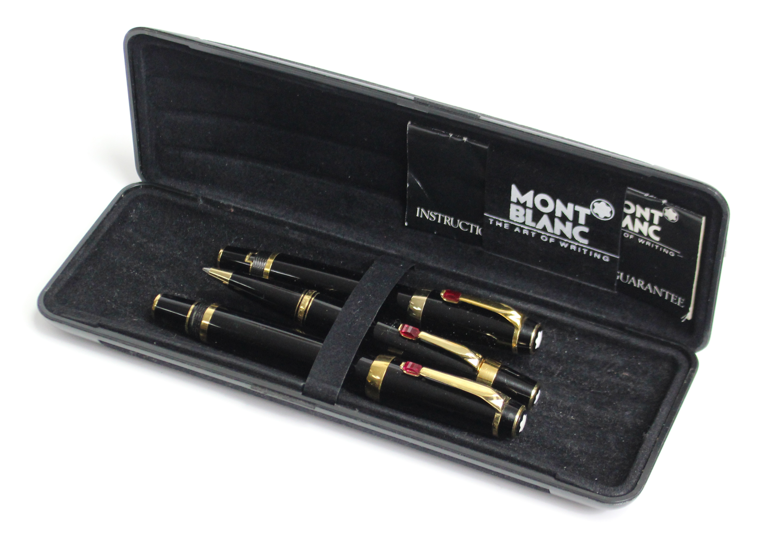 A set of three Mont Blanc ball-point pens, cased.