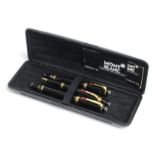 A set of three Mont Blanc ball-point pens, cased.