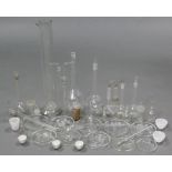 A collection of forty-two various glass laboratory receptacles.