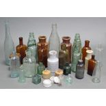 Twenty-seven various stoneware jars & glass bottles.