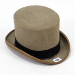 A Young’s light brown felt top hat.