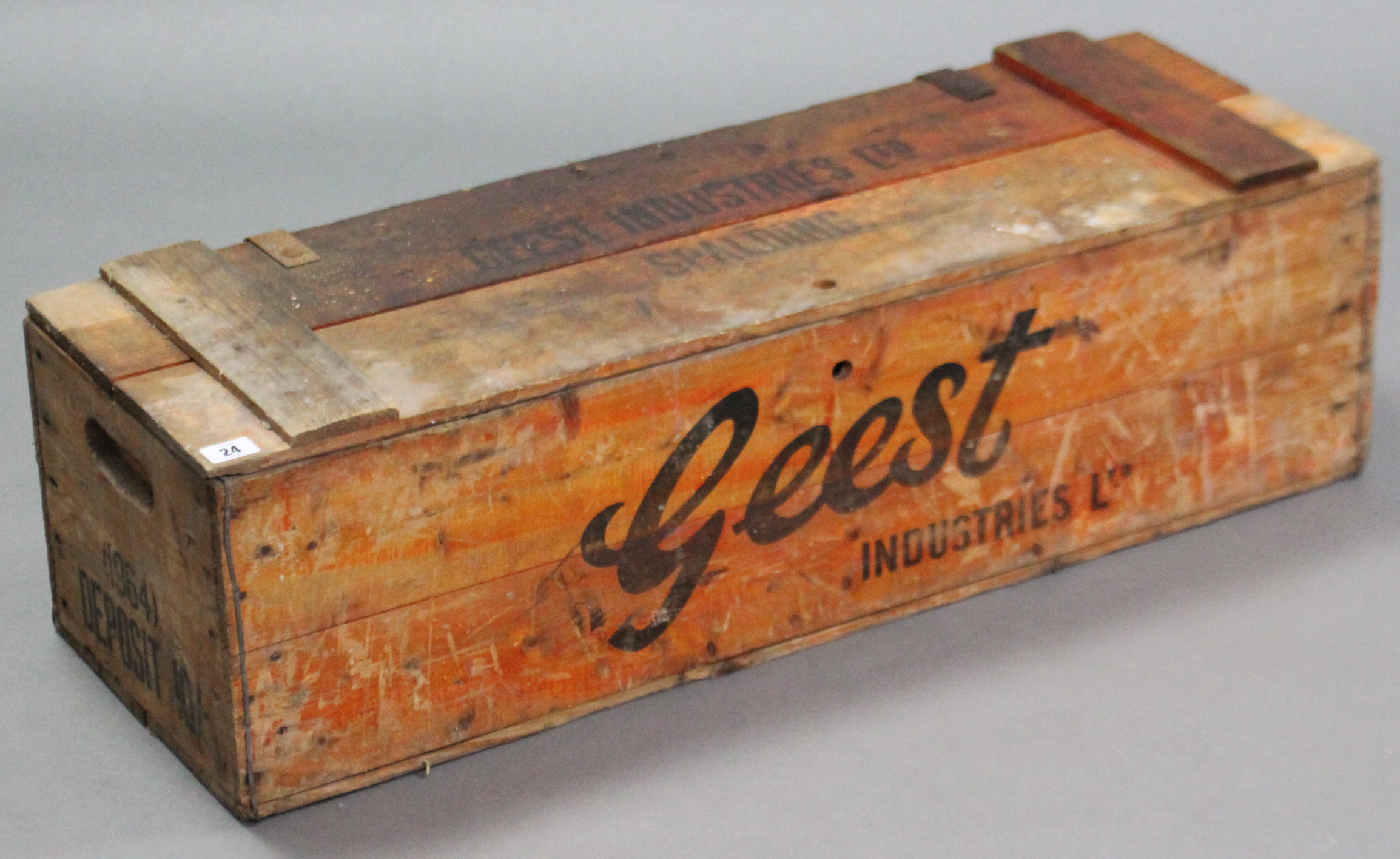 A 1960’s “Geest Industries Ltd. of Spalding” wooden crate, 35” long; & an Eclipse brass fertiliser