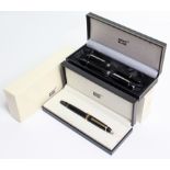 A Mont Blanc "No. 146" fountain pen; & a ditto pen set comprising a fountain pen & a ball-point pen,