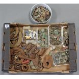 A collection of metal detector’s finds including coins, buckles, horse-shoes, etc.