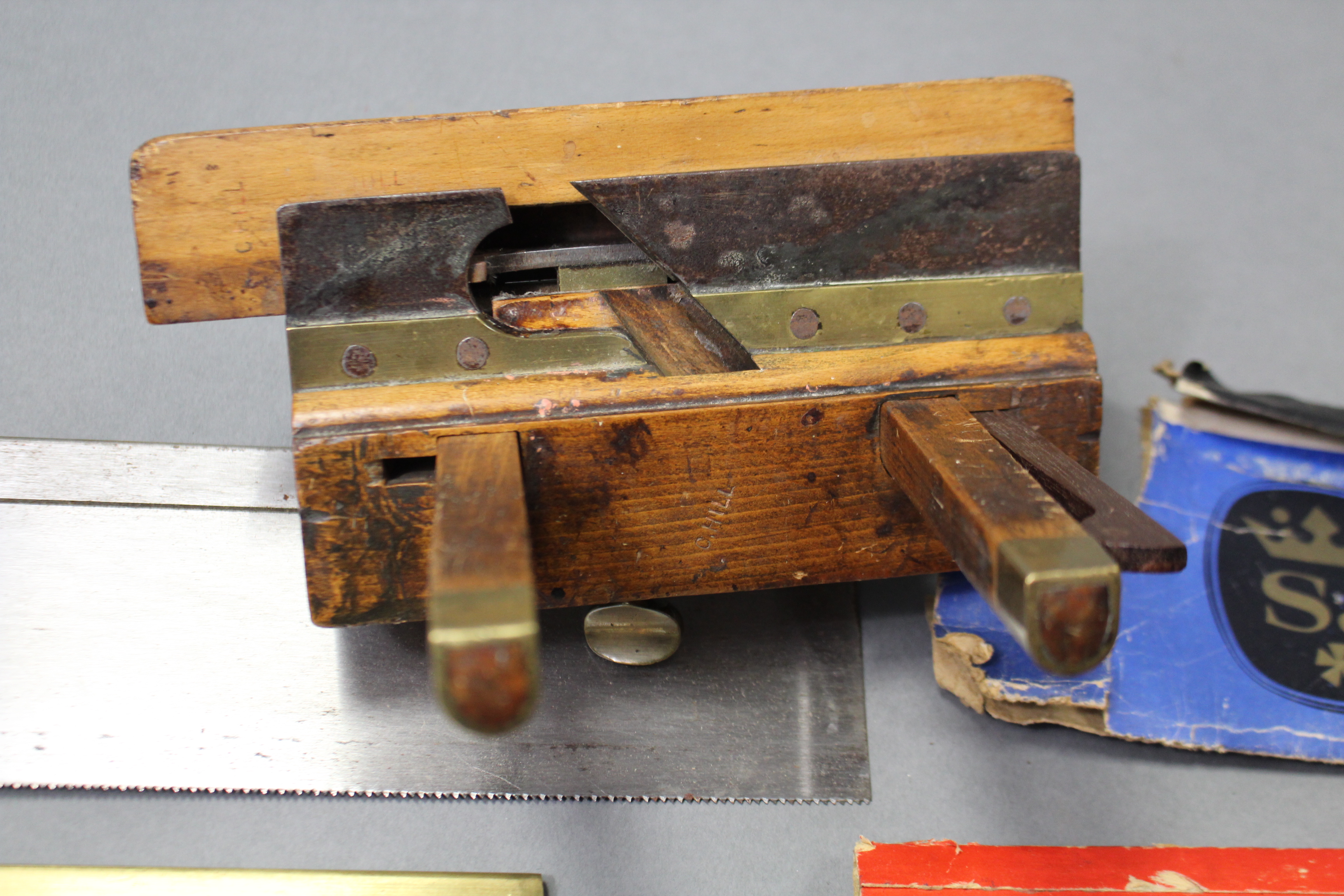 A Stanley Bailey “No. 5” smoothing plane; a treen moulding plane; two hand saws; & a spokeshave. - Image 3 of 3