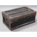 A WWI black painted deal Marshall patent ammunition trunk with hinged lift-lid, wrought-iron side