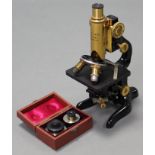 An early/mid-20th century Ernst Leitz Wetzlar brass & black lacquered monocular microscope (no.