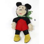 A mid-20th century Merrythought “Mickey Mouse” soft toy, 13” high.