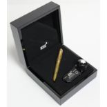 A Mont Blanc "No. 146" desk fountain pan in fitted case, & complete with a bottle of ink.