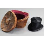 An early 20th century Tress & Co. of London black silk top-hat, retailed by Noke, Old Bond St., Bath