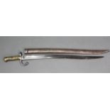 A mid-19th century French rifle bayonet with 22½” single-edge curved blade, with brass grip &