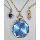 A circular hologram pendant in 9ct. gold mount, on yellow metal chain necklace (the necklace 7gm); a