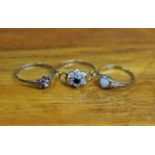 Three 9ct. gold gem-set dress rings.