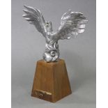 A cast alluminium model of a Phoenix, with wings spread, on tapered oblong wooden base, 17" high ove