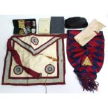 Three Masonic regalia medals; & a Masonic regalia apron & sash; all contained in a small japanned-
