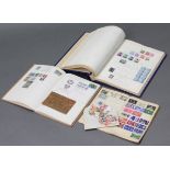 An album & contgents of Dutch stamps; two small albums & contents of G. B. & foreign stamps; & a