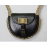 An early/mid-20th century bus conductor’s leather shoulder bag stamped “TYER & CO. LTD. GILDFORD