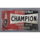A mid-20th century tin rectangular sign “DEPENDABLE CHAMPION SPARK PLUG SERVICE”, 13” X 23”.