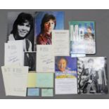 A collection of autographs including Cliff Richard, Henry Cooper, Morecambe & Wise, Fred Archer,