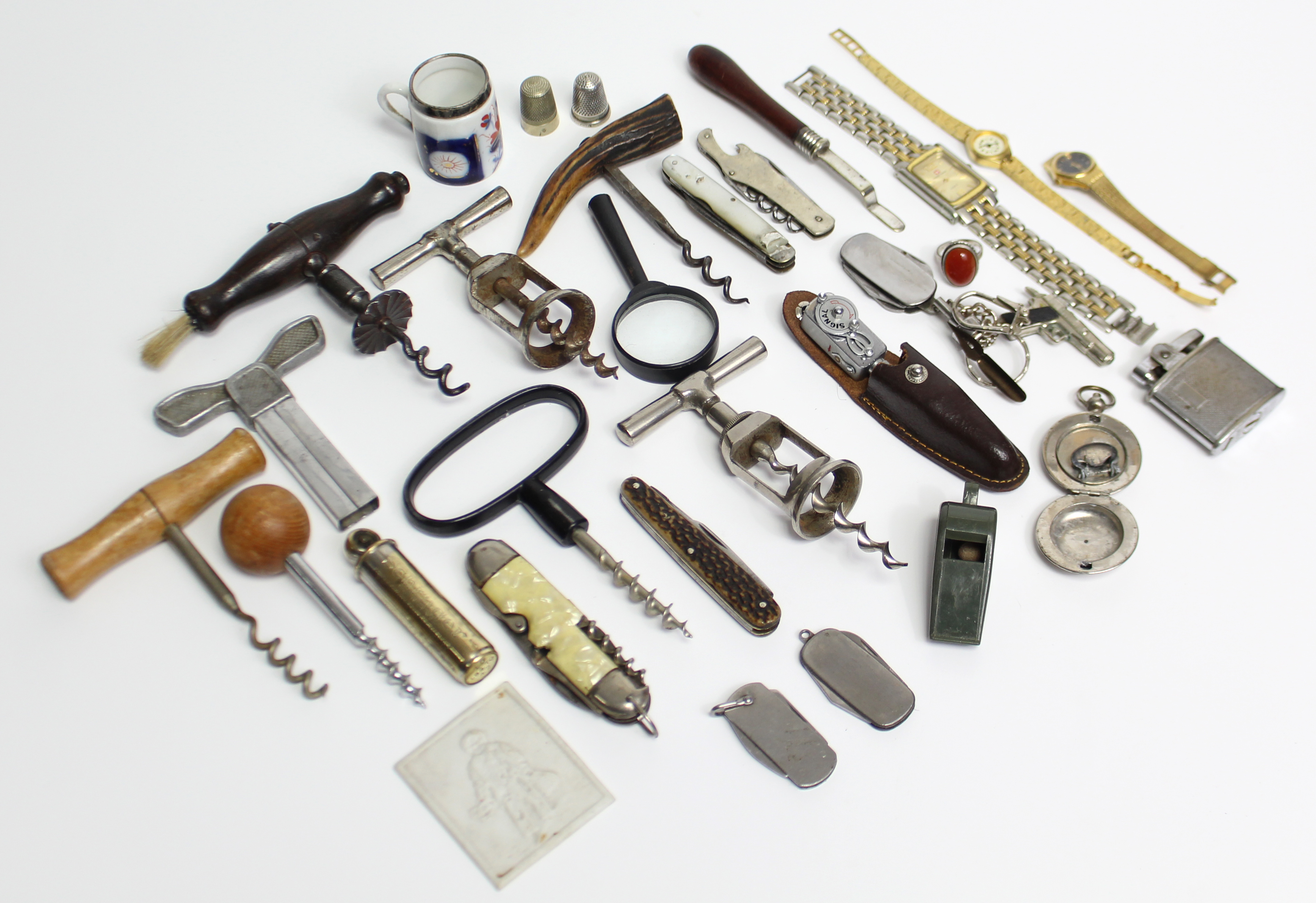 Eight various corkscrews; six pocket knives; a cigarette lighter, etc.