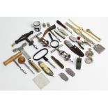 Eight various corkscrews; six pocket knives; a cigarette lighter, etc.