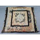 A Victorian patchwork double-sided bedspread with floral motifs, 65" x 64" (w.a.f.).
