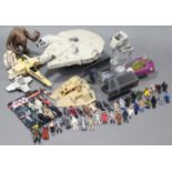 Approximately forty various Star Wars models & action figures including, The Millenium Falcon, At-At