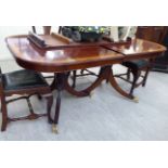 A modern Regency style mahogany dining table,