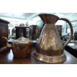 A Victorian style bell design copper measure with a rivetted handle;