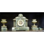 A late Victorian mottled green onyx and gilt metal mounted three piece clock garniture with a