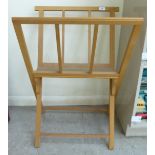 A modern Mabel light coloured beech framed folding folio stand 22''h 33''w BS