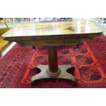 A Regency rosewood card table with a foldover top, enclosing a baize lined interior,