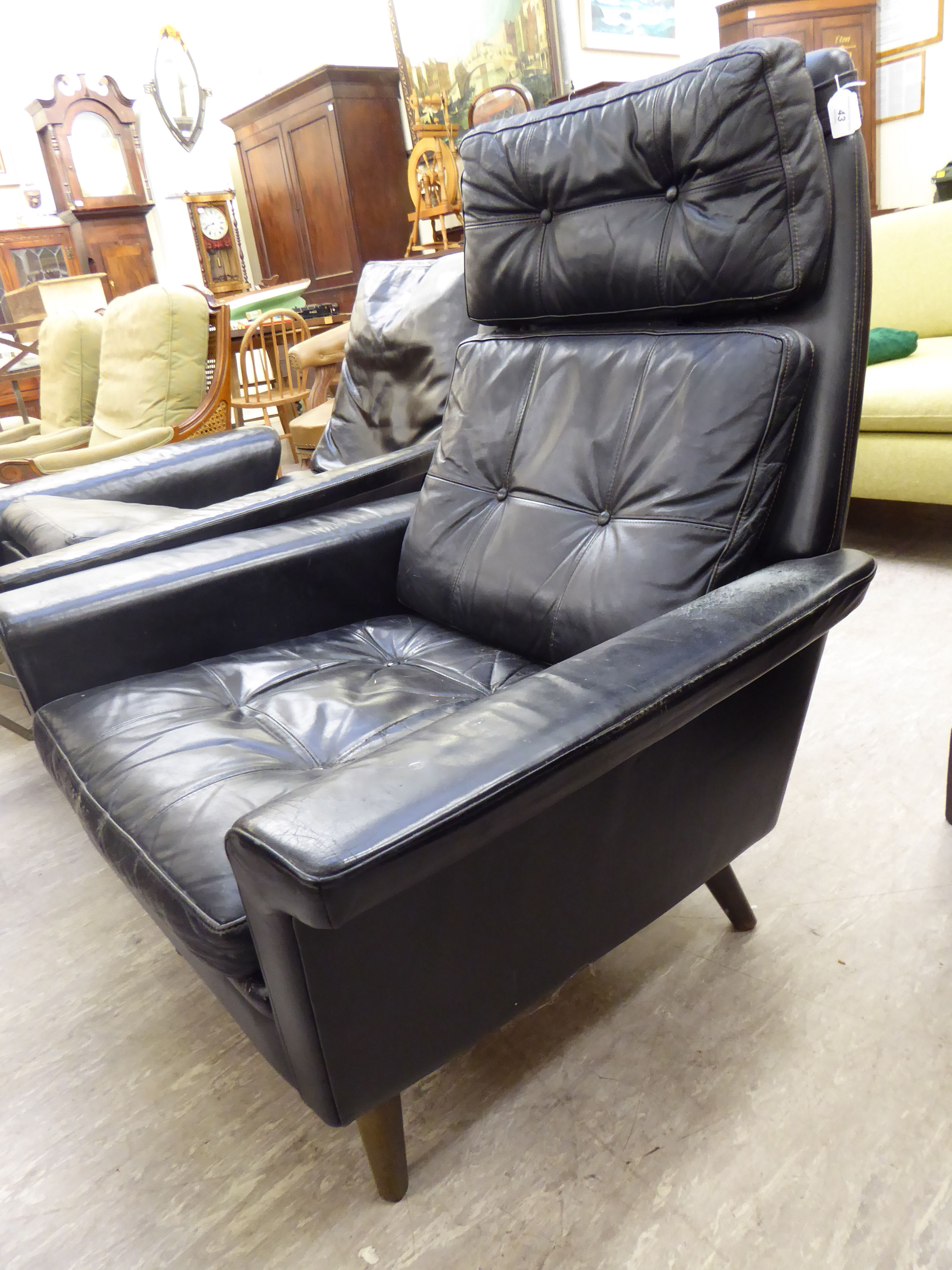 A 1960s/70s chair with a high back and low, level enclosed arms, upholstered in buttoned, - Image 2 of 4