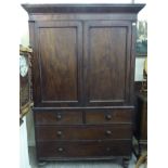 A mid Victorian mahogany linen press with two panelled doors, two short/two long drawers,